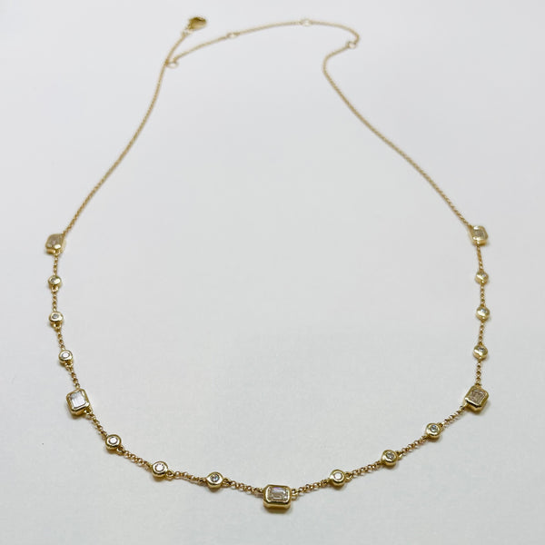 Emerald and brilliant cut diamond bezel set fringe necklace