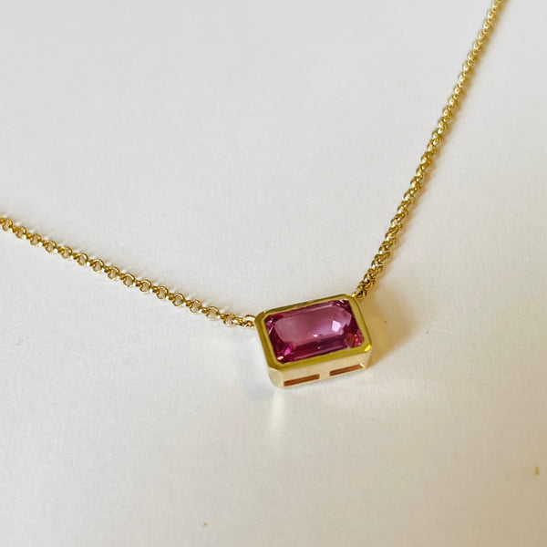 bezel set pink sapphire on 14 k gold chain
