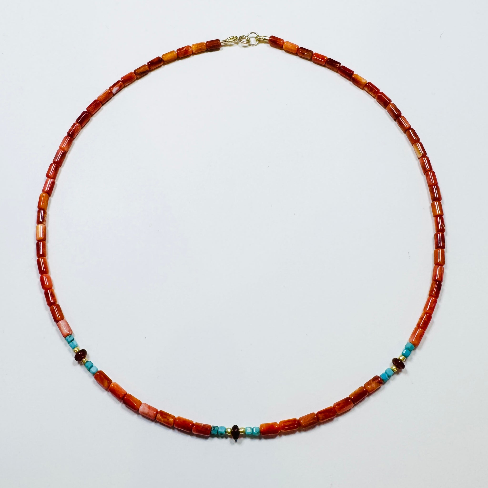 coral, turquoise, carnelian, and gold beads