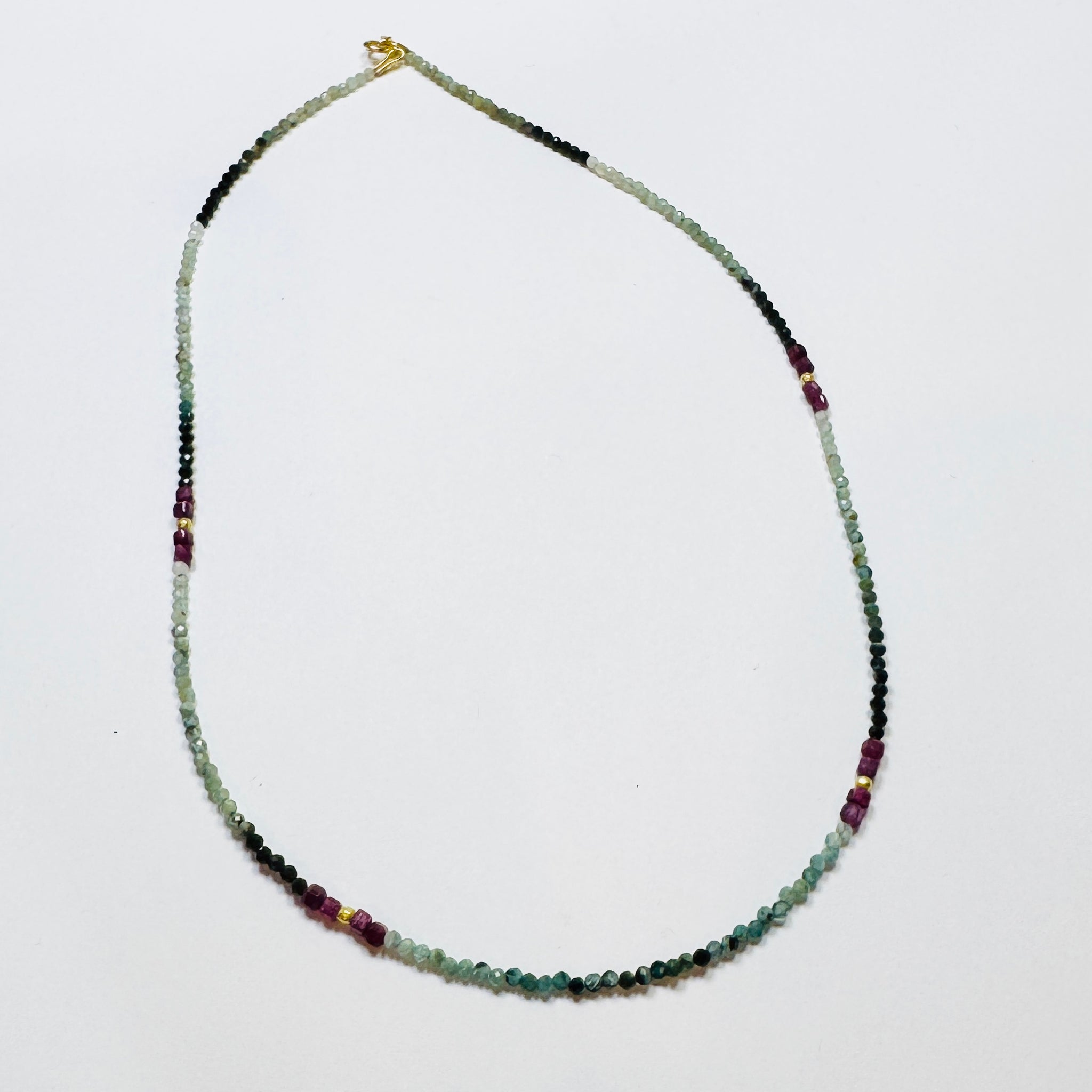 delicate teal tourmaline necklace with ruby and gold nuggets