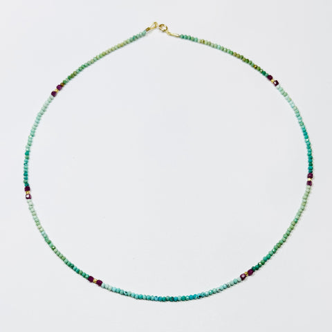 delicate shaded turquoise necklace with ruby block and gold nuggets