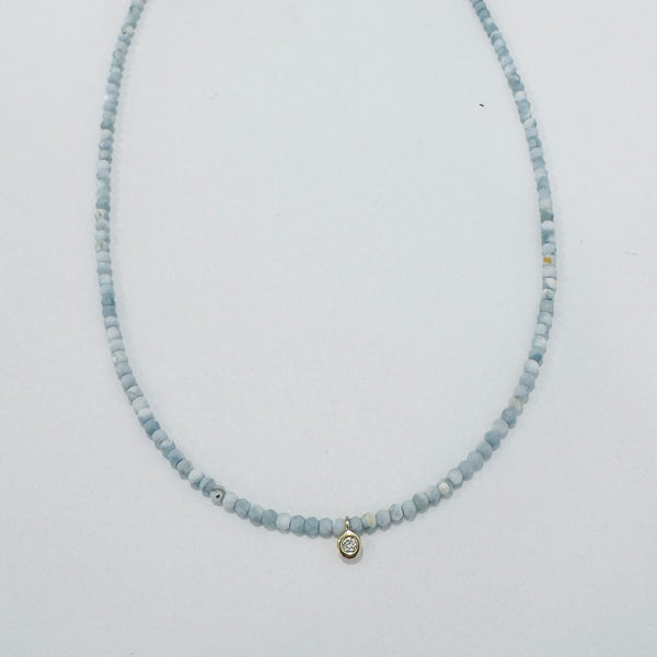 delicate necklace with gypsy set diamond