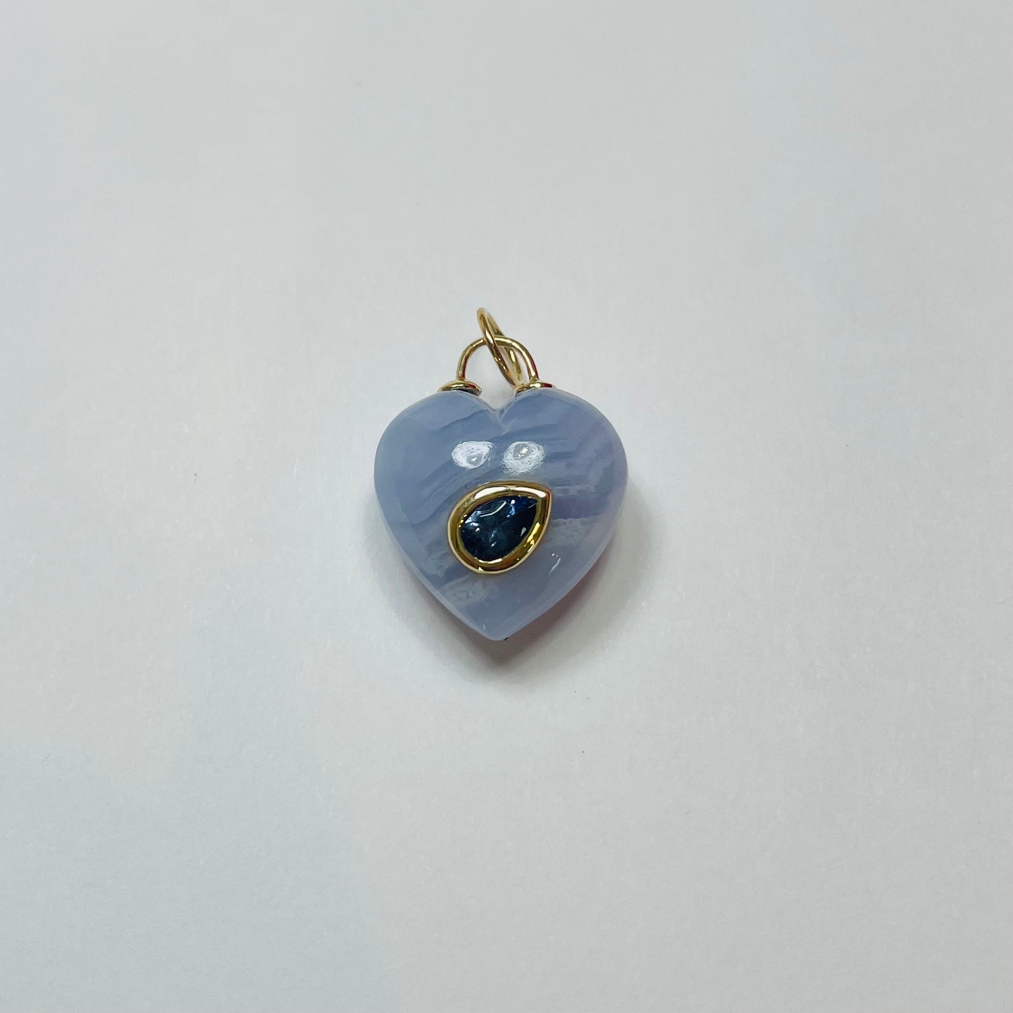 puffy lavendar chalcedony heart pendant with iolite