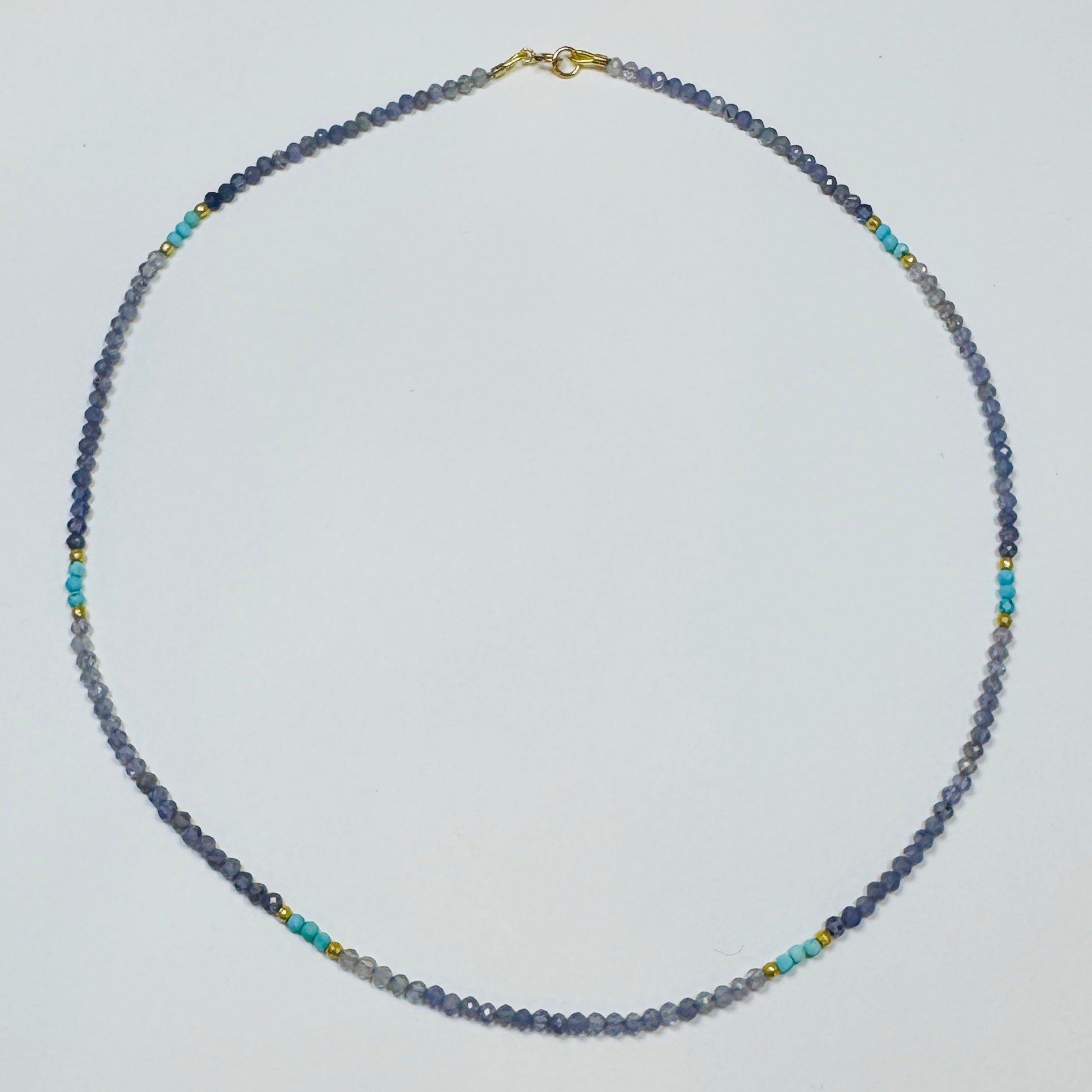 delicate iolite necklace with turquoise and gold nuggets