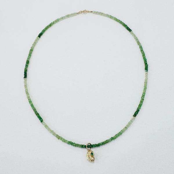 shaded emerald with nautilus charm