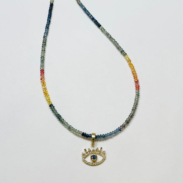 delicate sapphire necklace with evil eye charm