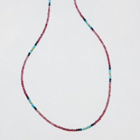 delicate shaded pink sapphire necklace with turquoise, lapis, and gold nuggets