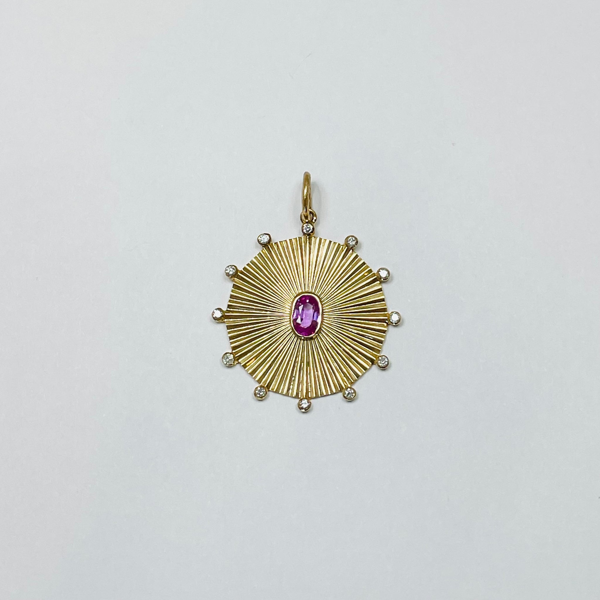 fluted pink sapphire and diamond ships wheel pendant
