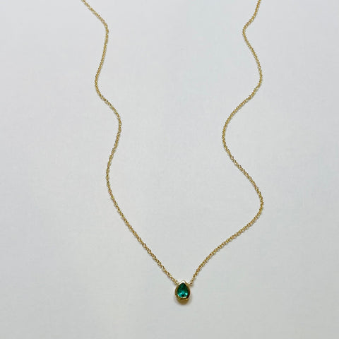 bezel set pear shaded emerald necklace