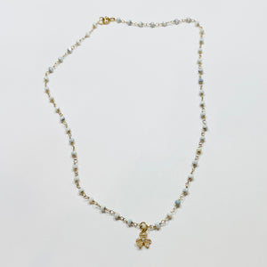 delicate wire wrapped necklace with pavè diamond clover charm