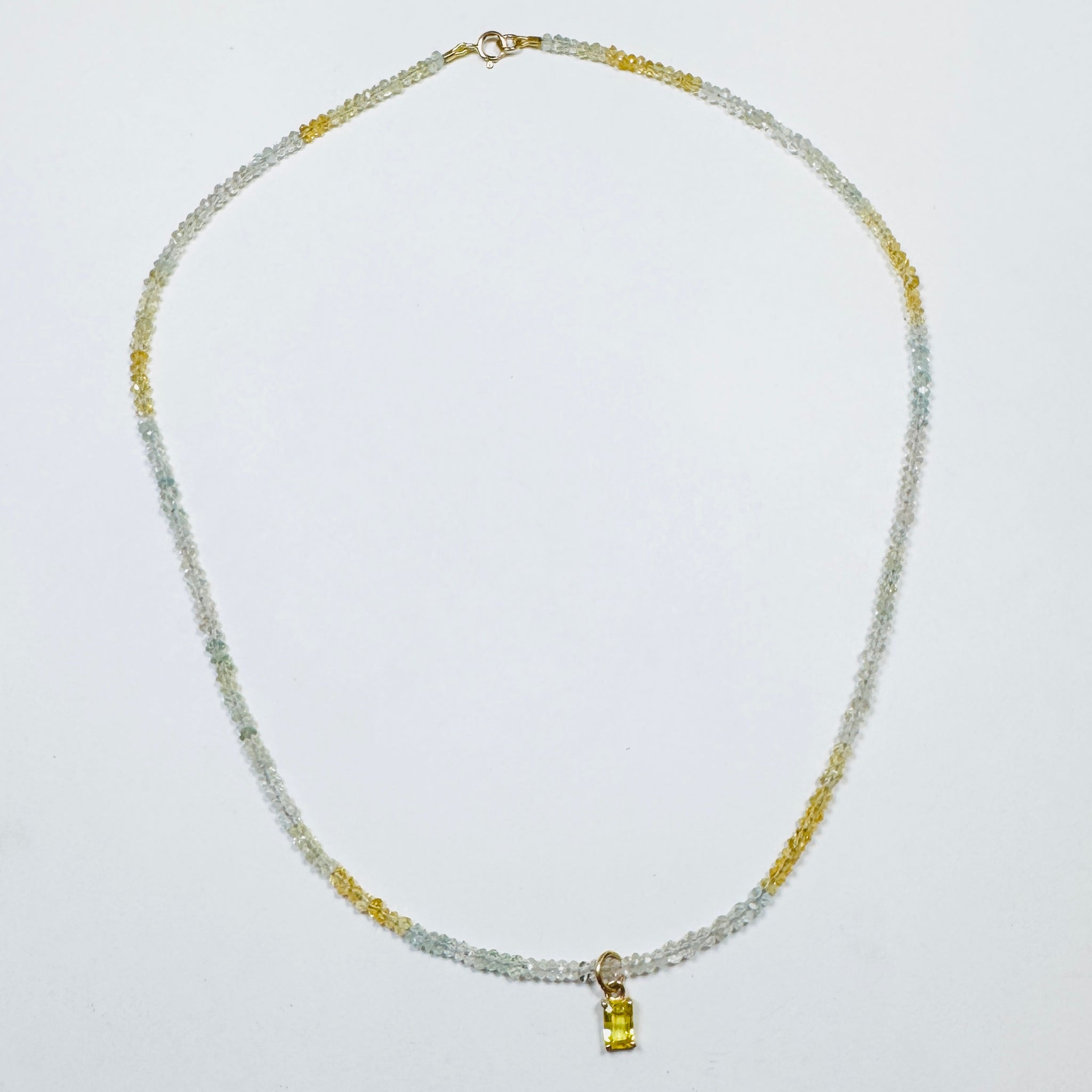 Aquamarine necklace with yellow sapphire charm