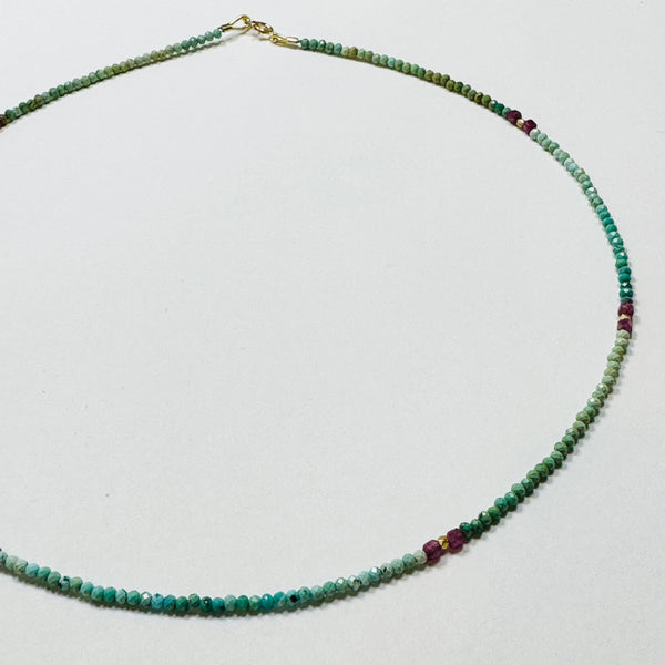 delicate shaded turquoise necklace with ruby block and gold nuggets