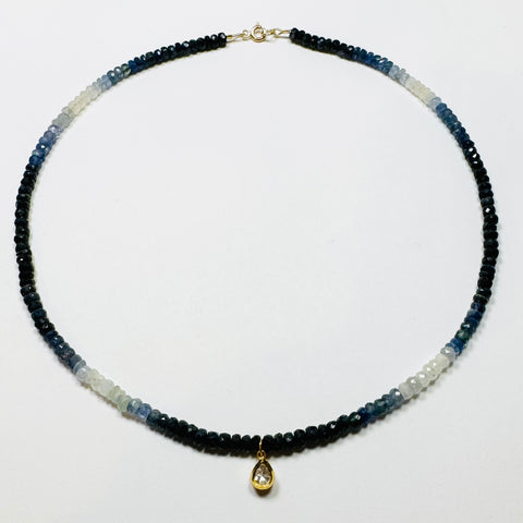 shaded blue sapphire necklace with rough cut, diamond teardrop charm Shaded blue sapphire necklace with charm
