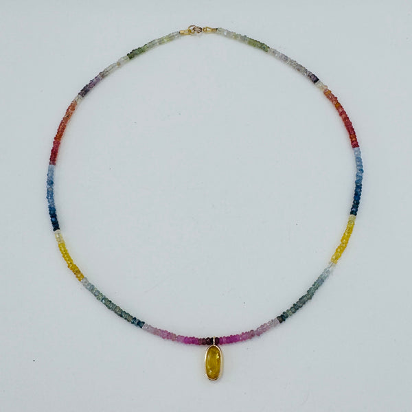 sapphire charm on shaded sapphire necklace