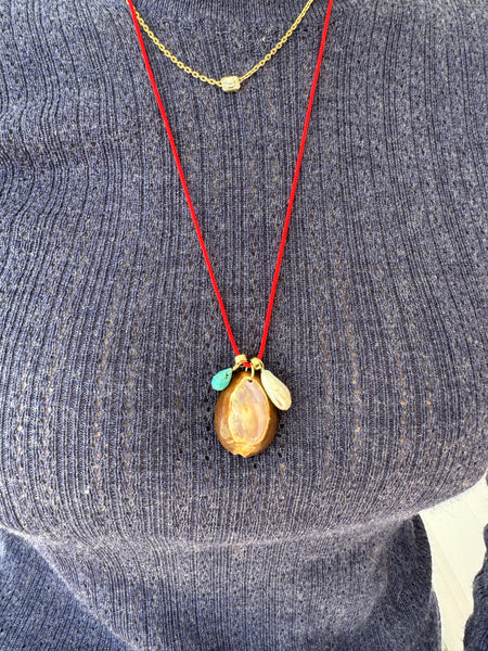 Kumihimo silk cord charm necklace, red with turquoise, pearl, and purple cowrie shell