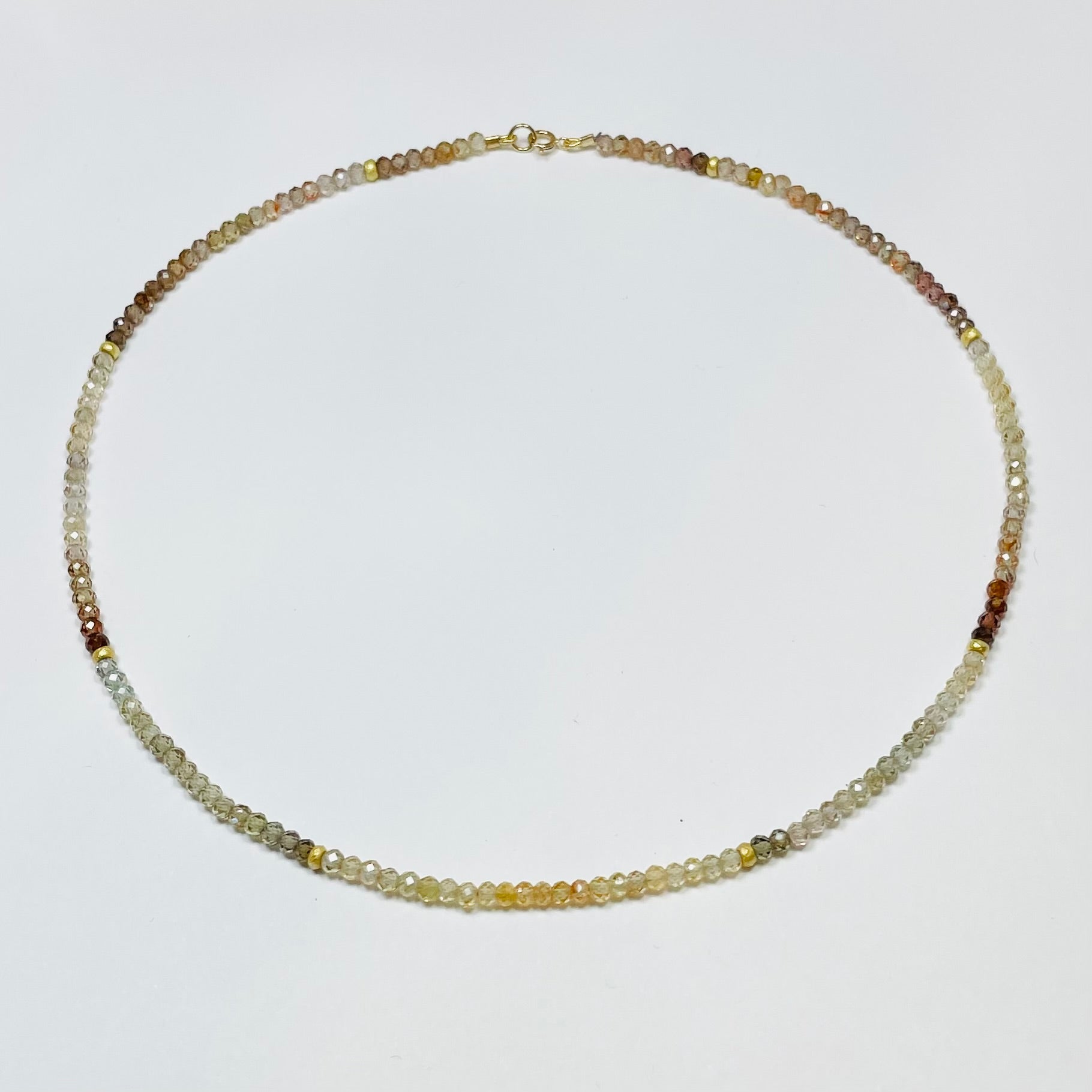 delicate zircon necklace with gold beads