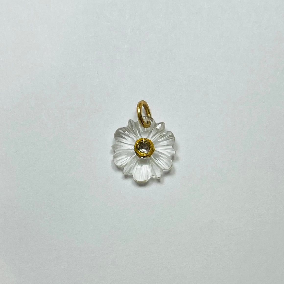 carved clear quartz flower pendant, 5/8 in