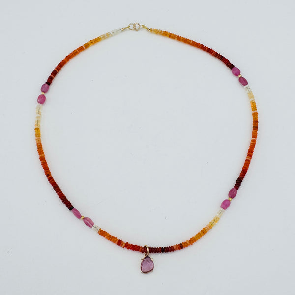 sapphire charm on shaded sapphire necklace
