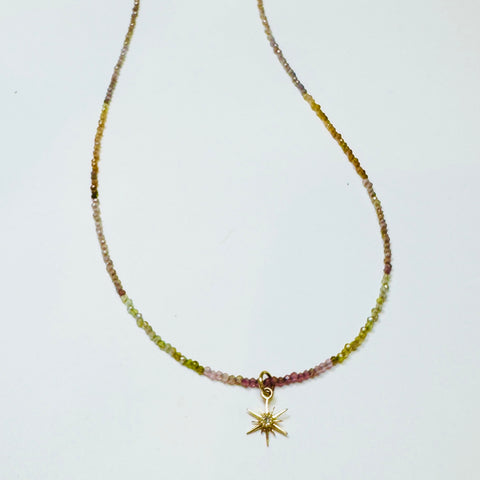 delicate shaded spinel necklace with diamond burst charm