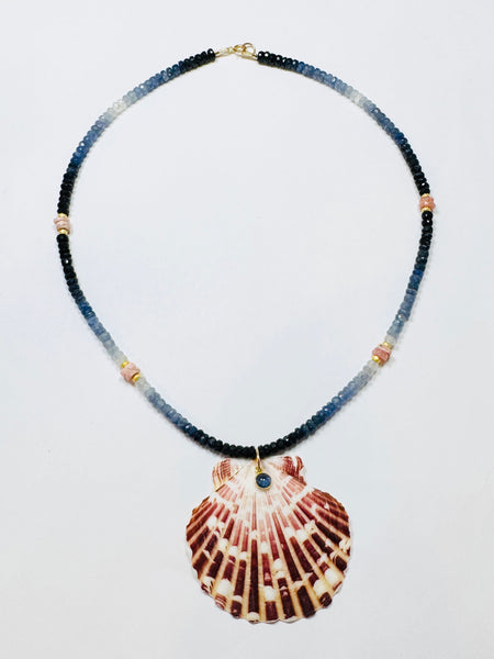 shaded blue sapphire necklace with shell pendant