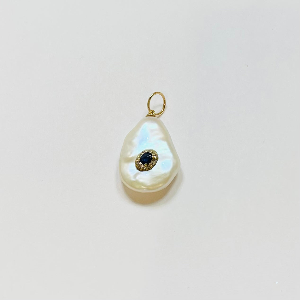 baroque pearl pendant, blue sapphire