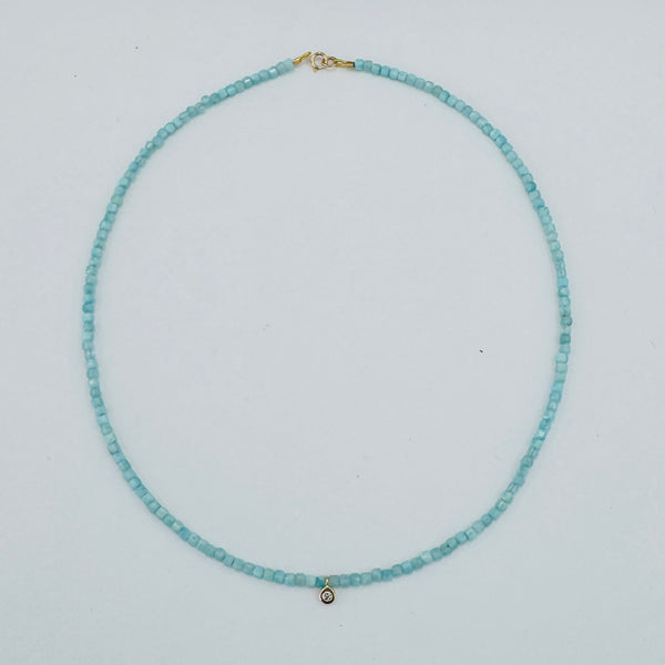 delicate necklace with gypsy set diamond