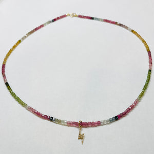 delicate shaded tourmaline necklace with lightning bolt charm