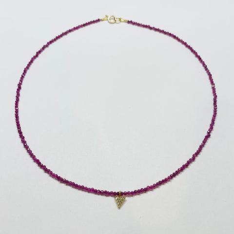 delicate ruby necklace with triangle charm