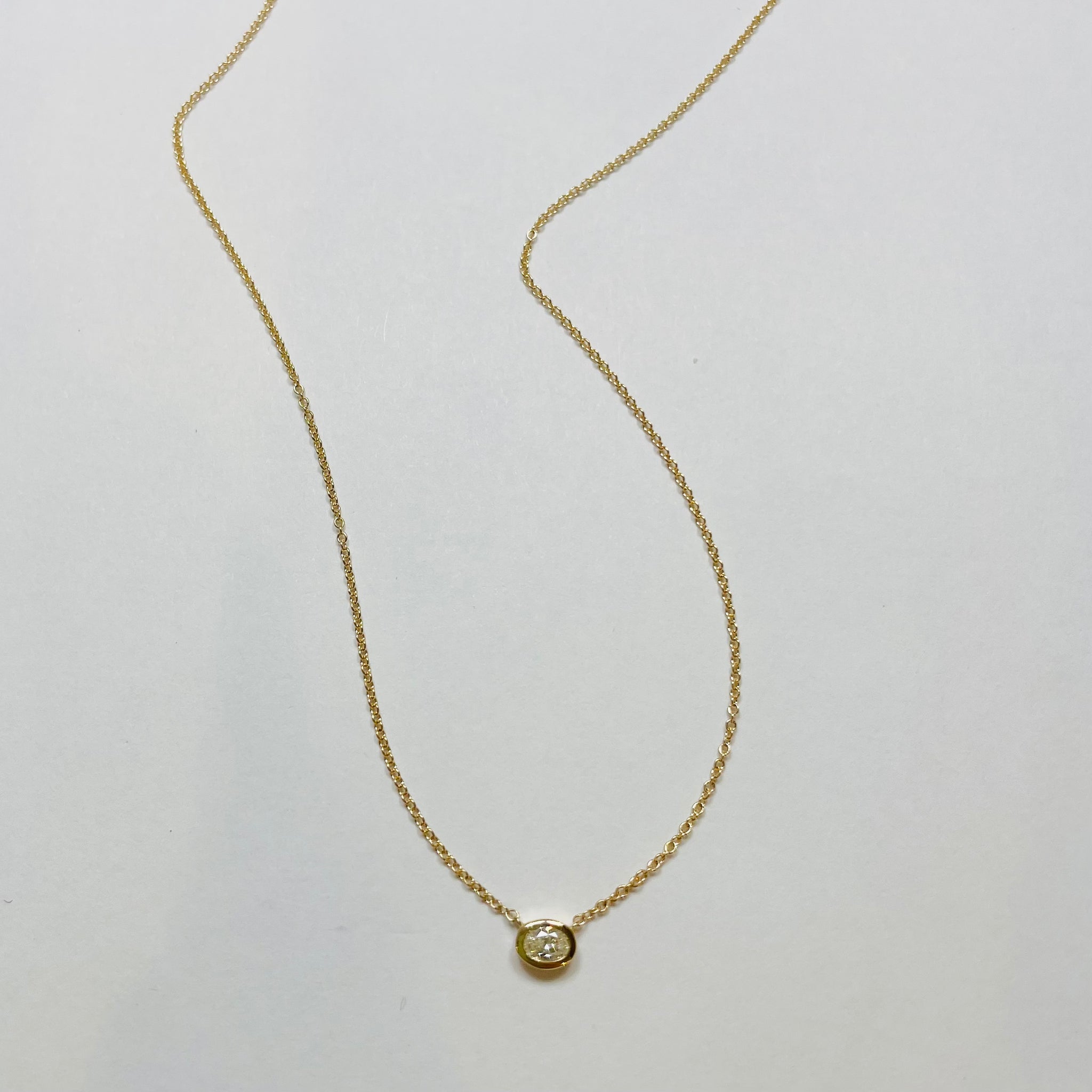 oval bezel set diamond necklace
