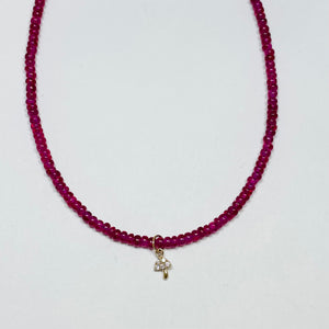 delicate smooth ruby necklace with mushroom charm