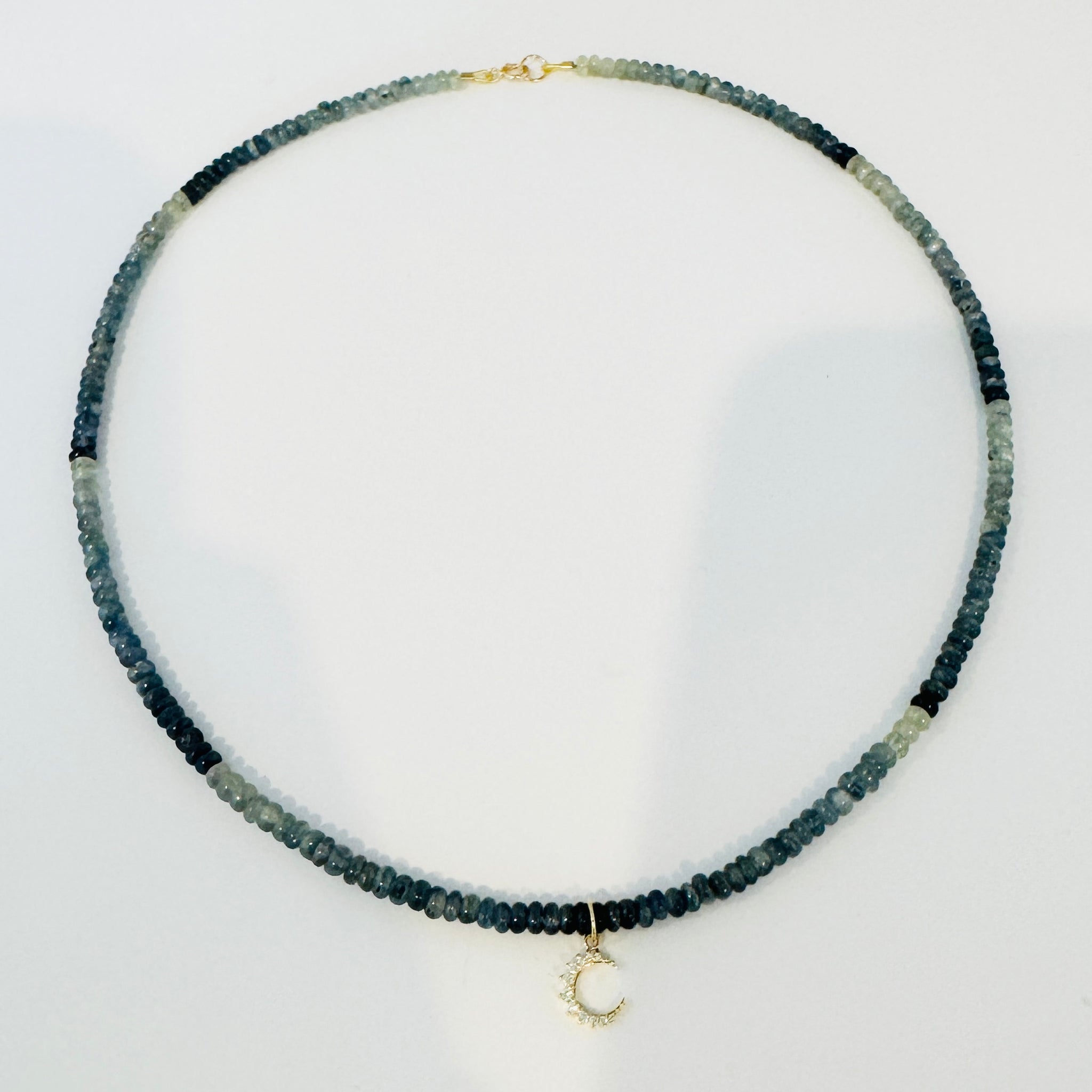 blue sapphire necklace with moon charm