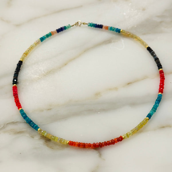 multicolored Ethiopian opal with gold beads