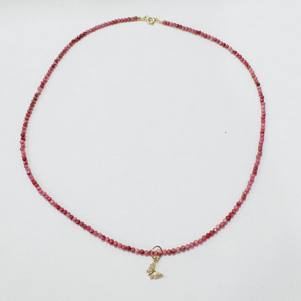 delicate gemstone necklace with diamond butterfly charm