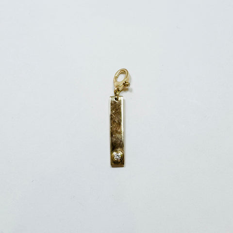 gold bezel set diamond dog tag pendant