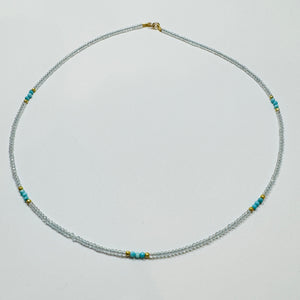 delicate blue zircon necklace with turquoise and gold nuggets