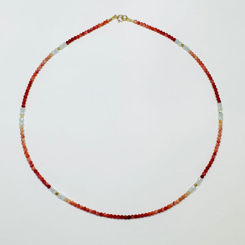 delicate rhodochrosite necklace with blue chalcedony blocks and gold nuggets