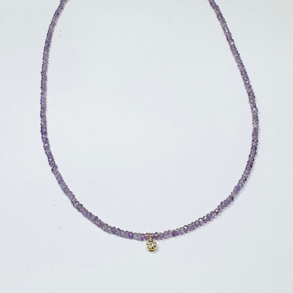 delicate necklace with bezel set diamond