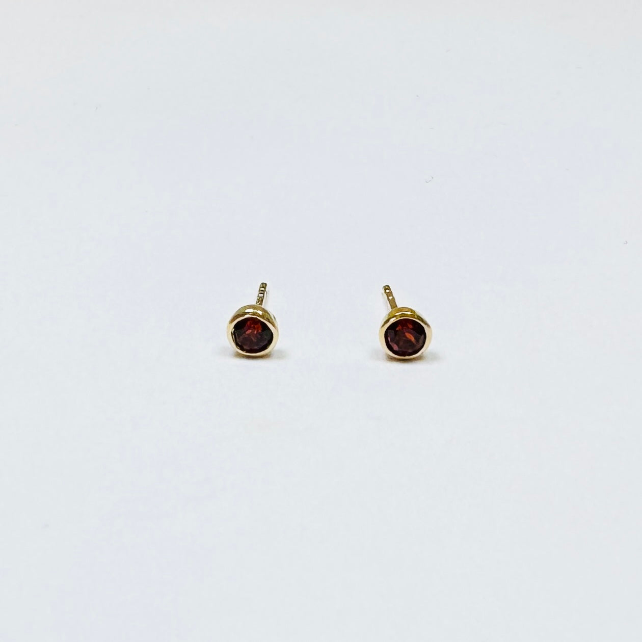 garnet bezel set studs