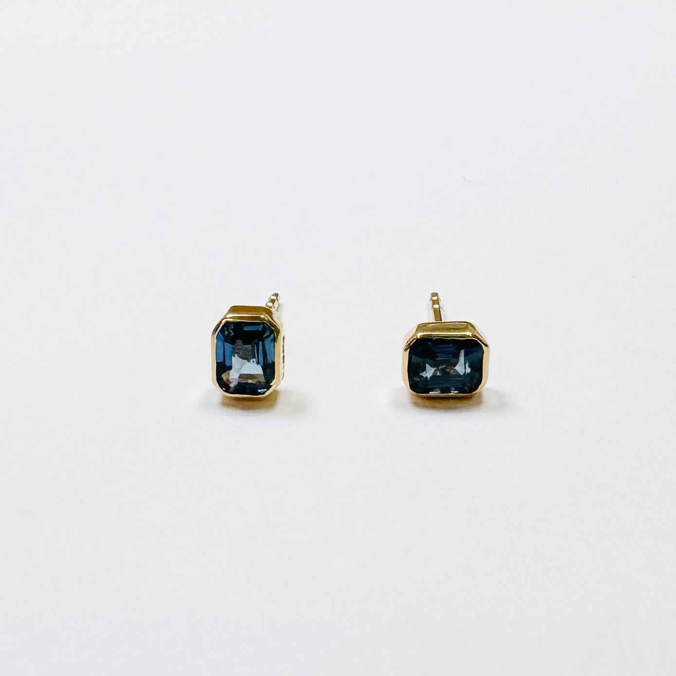 bezel sapphire studs