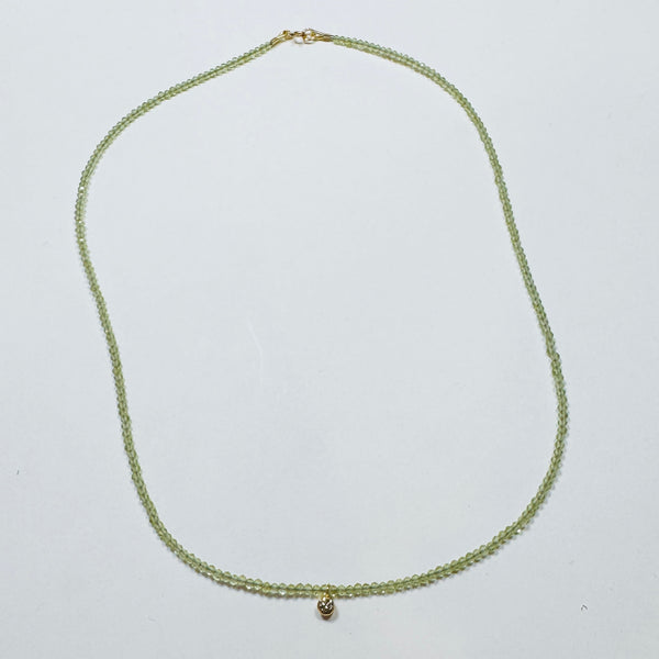 delicate necklace with bezel set diamond