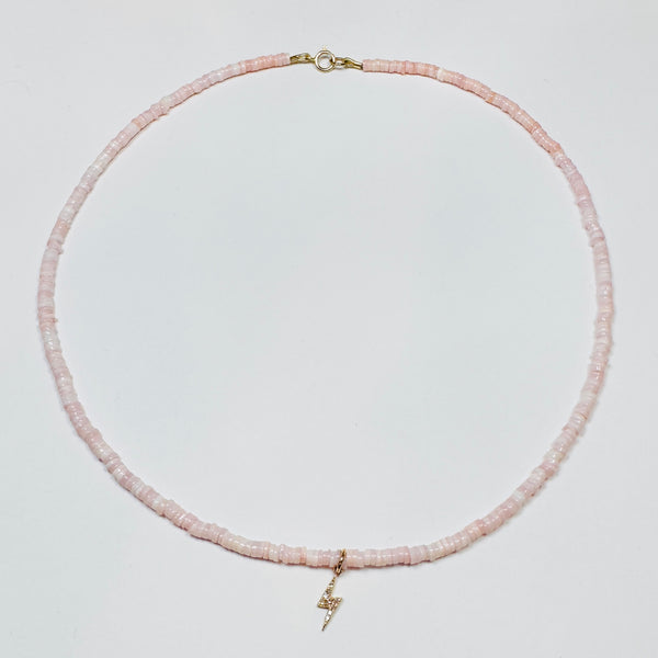 delicate gemstone necklace with lightning bolt charm
