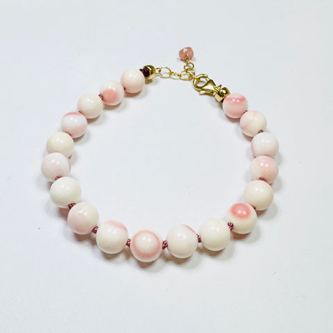 pink conch knotted bracelet