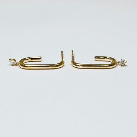 elongated gold hoops