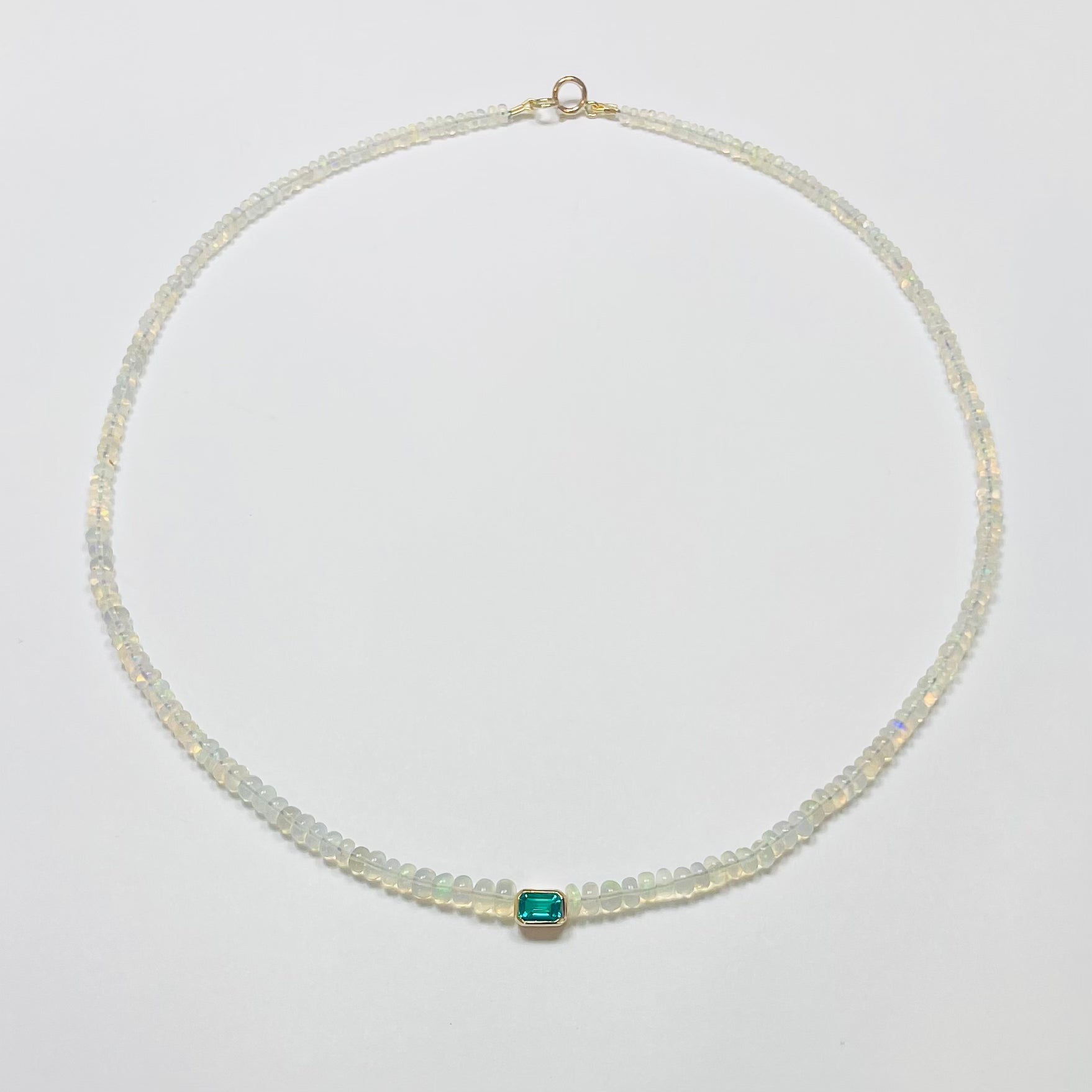 opal heishi necklace with bezel emerald