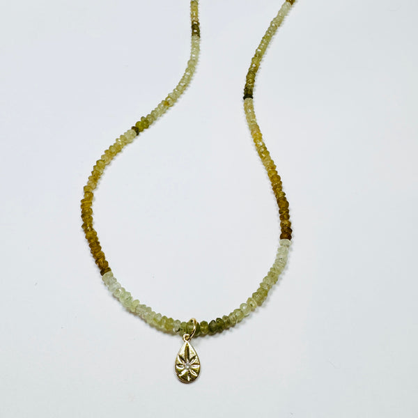 gemstone chain with diamond and gold teardrop