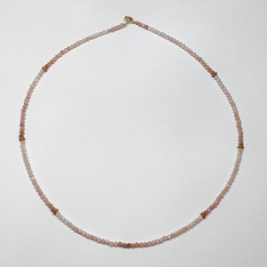 delicate pink opal necklace with gold beads