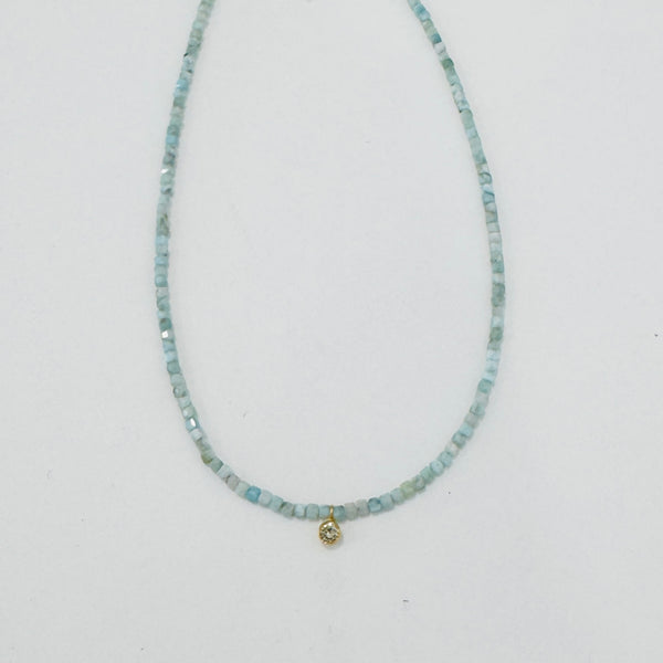delicate necklace with bezel set diamond