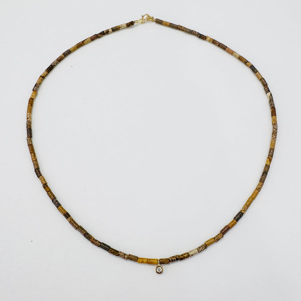 delicate necklace with gypsy set diamond