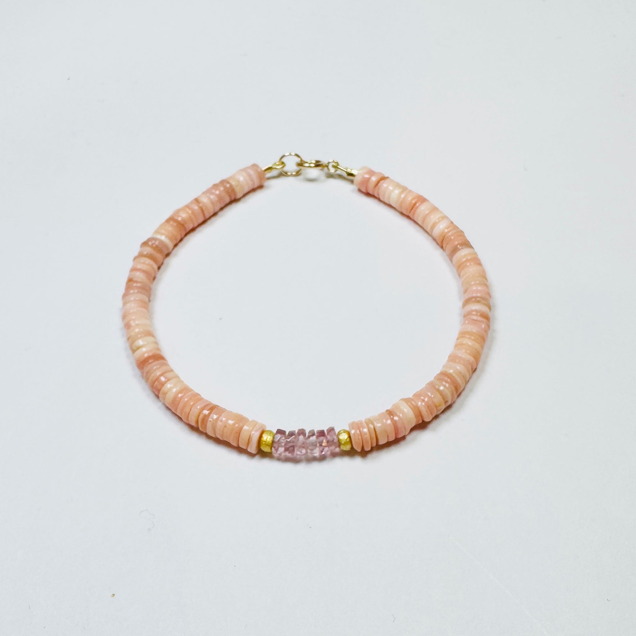 pink conch and sapphire bracelet