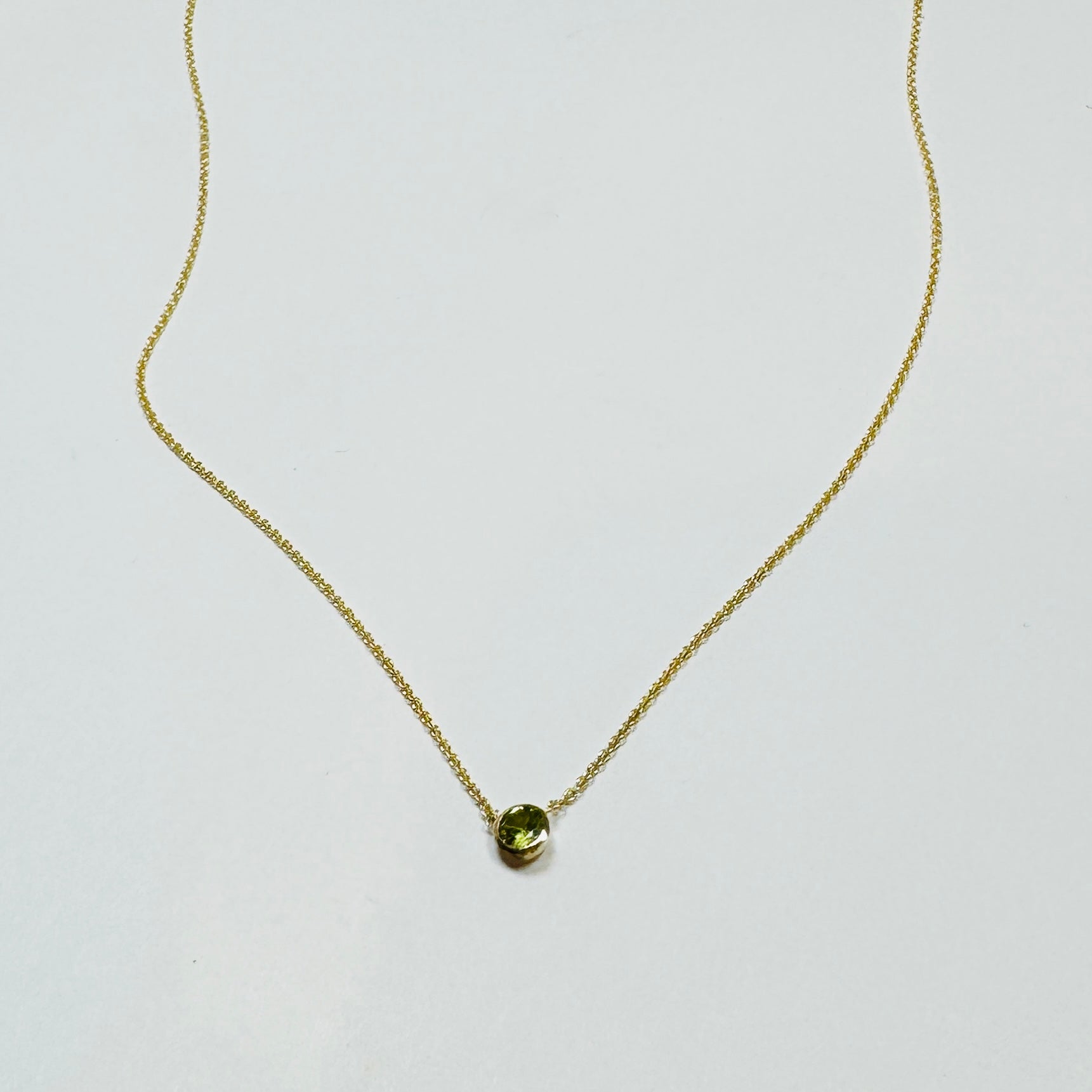 bezel set peridot necklace